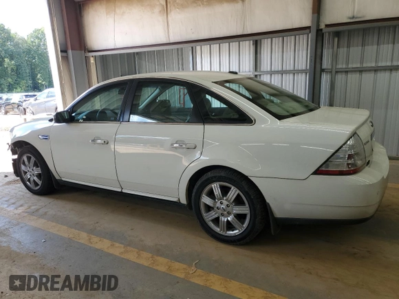 2009 Ford Taurus Limited with VIN 1FAHP25W99G118095, listed as a Copart auction lot 72501104 with 273,259 mi miles and Salvage Title. Bid and sale history available at carsss.com. Image 2.