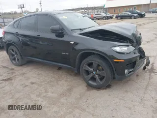 2012 BMW X6 35i z VIN 5UXFG2C55CLX09453, wystawiony jako IAAI lot #41826367 z przebiegiem 97 152 mil mil oraz . Historia ofert i sprzedaży dostępna na DreamBid. Obrazek 1.