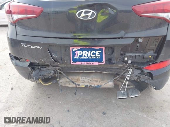 2018 Hyundai Tucson Sport with VIN KM8J33AL7JU772152, listed as a IAAI auction lot 41285203 with 87,188 mi miles. Bid and sale history available at carsss.com. Image 6.