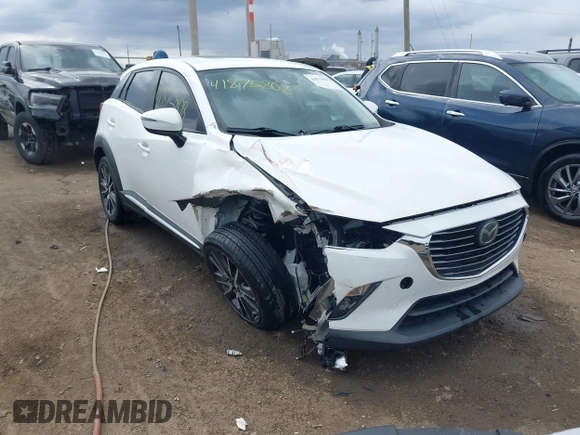 2016 Mazda CX-3 Grand Touring with VIN JM1DKFD73G0129737, listed as a IAAI auction lot 41875808 with 120,547 mi miles. Bid and sale history available at carsss.com. Image 6.