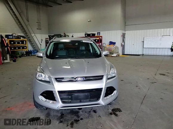 2016 Ford Escape Titanium with VIN 1FMCU9J95GUC27654, listed as a Copart auction lot 51950575 with 101,220 mi miles and Salvage Title. Bid and sale history available at carsss.com. Image 12.