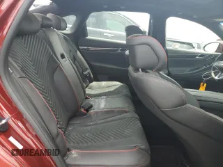 2024 Genesis G80 Sport z VIN KMTGB4SD0RU238017, wystawiony jako Copart lot #56281175 z przebiegiem Nie podano mil oraz Nie do naprawy • Non repairable. Historia ofert i sprzedaży dostępna na DreamBid. Obrazek 10.