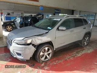 2019 Jeep Cherokee Limited with VIN 1C4PJMDX0KD472477, listed as a Copart auction lot 61799415 with 61,037 mi miles and Salvage title. Bid and sale history available at DreamBid. Image 1.
