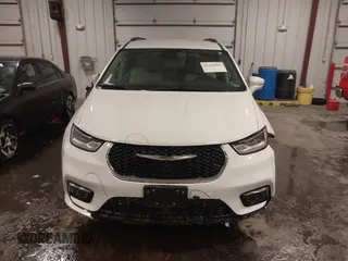2021 Chrysler Pacifica Touring L with VIN 2C4RC1BG3MR504293, listed as a IAAI auction lot 41728608 with 70,487 mi miles and . Bid and sale history available at DreamBid. Image 6.