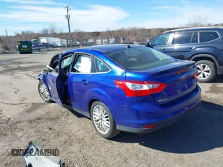 2014 Ford Focus Titanium with VIN 1FADP3J21EL427066, listed as a IAAI auction lot 41653163 with 1 mi miles. Bid and sale history available at carsss.com. Image 3.