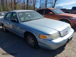 2004 Ford Crown Victoria LX with VIN 2FAFP74W64X121657, listed as a IAAI auction lot 41715463 with 205,885 mi miles. Bid and sale history available at carsss.com. Image 1.