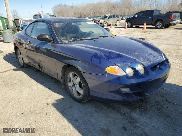 2001 Hyundai Tiburon with VIN KMHJG25F11U261457, listed as a Copart auction lot 43012635 with 165,625 mi miles and Salvage Title. Bid and sale history available at carsss.com. Image 4.