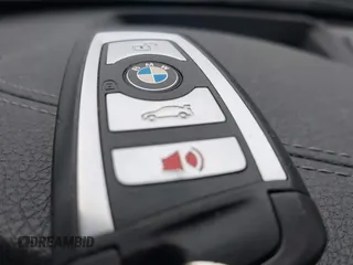 2018 BMW 4 Series 430i with VIN WBA4J1C50JBM11929, listed as a IAAI auction lot 41528161 with 52,412 mi miles. Bid and sale history available at carsss.com. Image 11.