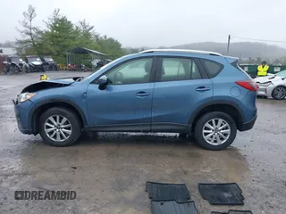 2016 Mazda CX-5 Sport with VIN JM3KE4BY5G0727608, listed as a IAAI auction lot 41975279 with 95,817 mi miles and . Bid and sale history available at carsss.com. Image 14.