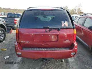 2006 GMC Envoy SLT with VIN 1GKDS13S762259102, listed as a Copart auction lot 79233224 with 125,404 mi miles and Salvage Title. Bid and sale history available at carsss.com. Image 6.