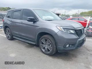 2020 Honda Passport EX-L z VIN 5FNYF8H5XLB018060, wystawiony jako IAAI lot #41961243 z przebiegiem 60 575 mil mil oraz . Historia ofert i sprzedaży dostępna na DreamBid. Obrazek 1.