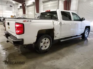 2014 Chevrolet Silverado 1500 LT with VIN 3GCUKREC0EG294862, listed as a Copart auction lot 53504995 with 115,164 mi miles and Salvage Title. Bid and sale history available at DreamBid. Image 3.