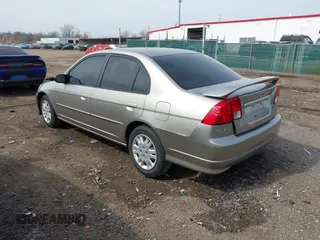 2004 Honda Civic LX with VIN 1HGES16564L001099, listed as a IAAI auction lot 41830582 with 157,151 mi miles. Bid and sale history available at carsss.com. Image 3.