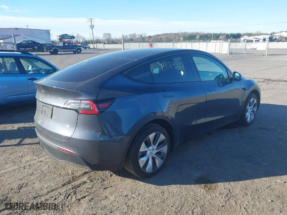 2023 Tesla Model Y Long Range with VIN 7SAYGDEE8PA140562, listed as a IAAI auction lot 41837231 with 30,847 mi miles. Bid and sale history available at carsss.com. Image 4.