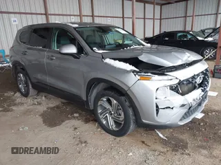 2021 Hyundai Santa Fe SE with VIN 5NMS14AJ4MH330556, listed as a IAAI auction lot 41297743 with 101,156 mi miles. Bid and sale history available at carsss.com. Image 1.