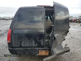 1996 Chevrolet Suburban with VIN 3GNEC16R9TG167845, listed as a Copart auction lot 80119734 with 414,794 mi miles and Salvage title. Bid and sale history available at DreamBid. Image 6.
