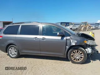 2012 Toyota Sienna XLE AAS with VIN 5TDYK3DC1CS186331, listed as a IAAI auction lot 41545031 with 240,788 mi miles and . Bid and sale history available at DreamBid. Image 13.
