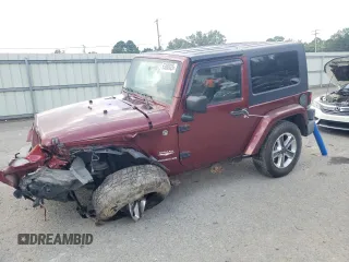 2007 Jeep Wrangler Sahara with VIN 1J4FA54137L205242, listed as a Copart auction lot 65080025 with 128,682 mi miles and Salvage title. Bid and sale history available at DreamBid. Image 1.