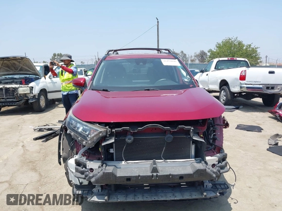 2019 Toyota RAV4 LE with VIN JTMK1RFV4KD025587, listed as a IAAI auction lot 42459046 with 73,852 mi miles and . Bid and sale history available at DreamBid. Image 13.
