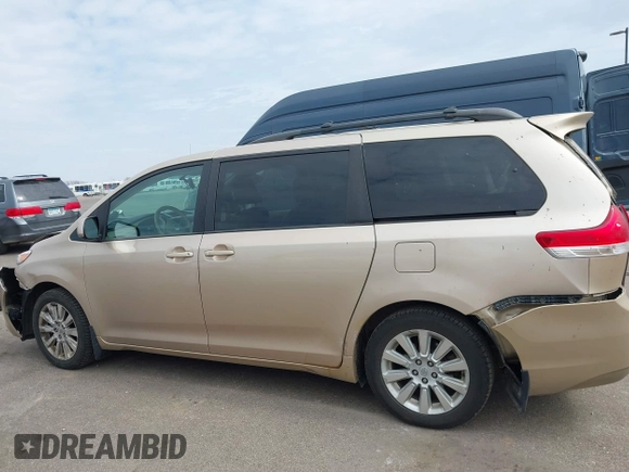 2013 Toyota Sienna XLE with VIN 5TDDK3DC4DS055796, listed as a IAAI auction lot 41993530 with 256,735 mi miles and . Bid and sale history available at DreamBid. Image 14.