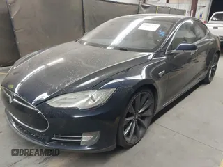 2014 Tesla Model S 60 with VIN 5YJSA1H11EFP56406, listed as a IAAI auction lot 42065157 with Not Provided miles and . Bid and sale history available at DreamBid. Image 2.