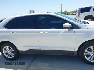 2015 Ford Edge SEL with VIN 2FMTK3J97FBC16209, listed as a IAAI auction lot 41974393 with 129,608 mi miles. Bid and sale history available at carsss.com. Image 14.