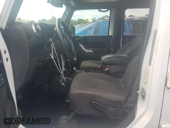 2017 Jeep Wrangler Unlimited Sahara with VIN 1C4BJWEG7HL684621, listed as a Copart auction lot 62403015 with 92,786 mi miles and Salvage title. Bid and sale history available at DreamBid. Image 7.