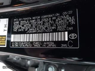 2022 Toyota Prius L Eco with VIN JTDKAMFUXN3174204, listed as a IAAI auction lot 41747089 with 79,531 mi miles. Bid and sale history available at carsss.com. Image 9.