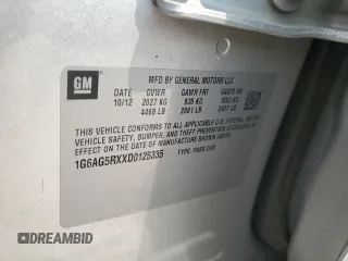 2013 Cadillac ATS z VIN 1G6AG5RXXD0125335, wystawiony jako Copart lot #59125695 z przebiegiem Nie podano mil oraz Czysty tytuł • Clean title. Historia ofert i sprzedaży dostępna na DreamBid. Obrazek 13.
