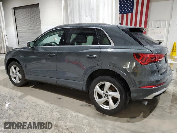 2022 Audi Q3 Premium with VIN WA1AUCF33N1002302, listed as a Copart auction lot 51973985 with 49,886 mi miles and Salvage title. Bid and sale history available at DreamBid. Image 2.