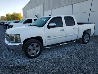 2011 Chevrolet Silverado 1500 LT with VIN 3GCPCSE00BG176118, listed as a Copart auction lot 48958465 with 110,538 mi miles and Salvage Title. Bid and sale history available at DreamBid. Image 1.