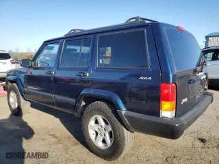 2001 Jeep Cherokee Sport with VIN 1J4FF48S61L617340, listed as a Copart auction lot 52340995 with 210,256 mi miles and Clean Title. Bid and sale history available at carsss.com. Image 2.