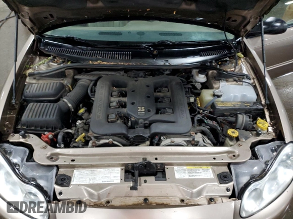 2002 Chrysler Concorde LXi z VIN 2C3HD36M12H144159, wystawiony jako Copart lot #74971064 z przebiegiem 115 421 mil mil oraz Szkoda całkowita • Salvage title. Historia ofert i sprzedaży dostępna na DreamBid. Obrazek 11.