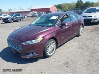 2013 Ford Fusion SE Hybrid with VIN 3FA6P0LU3DR225383, listed as a IAAI auction lot 42004176 with 187,991 mi miles. Bid and sale history available at carsss.com. Image 2.