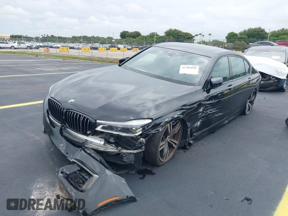 2018 BMW 7 Series 750i z VIN WBA7F0C54JGM23528, wystawiony jako IAAI lot #42205896 z przebiegiem 91 772 mil mil oraz . Historia ofert i sprzedaży dostępna na DreamBid. Obrazek 6.