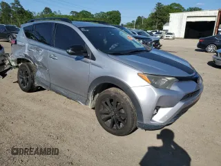 2018 Toyota RAV4 XLE with VIN 2T3RFREV5JW731373, listed as a Copart auction lot 51917465 with 124,623 mi miles and Salvage Title. Bid and sale history available at DreamBid. Image 4.