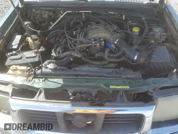 2000 Nissan Frontier XE with VIN 1N6ED27Y4YC382199, listed as a Copart auction lot 47127045 with 207,449 mi miles and Salvage title. Bid and sale history available at DreamBid. Image 12.