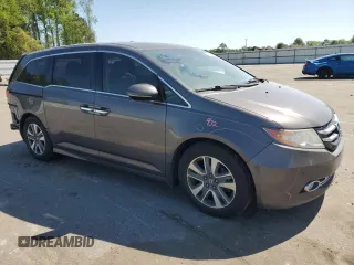 2016 Honda Odyssey Touring Elite with VIN 5FNRL5H91GB088163, listed as a Copart auction lot 50276495 with 197,274 mi miles and Salvage Title. Bid and sale history available at DreamBid. Image 4.