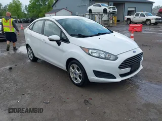 2014 Ford Fiesta SE z VIN 3FADP4BJ0EM182576, wystawiony jako IAAI lot #42271727 z przebiegiem 122 205 mil mil oraz . Historia ofert i sprzedaży dostępna na DreamBid. Obrazek 1.