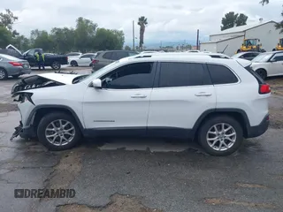 2015 Jeep Cherokee Latitude with VIN 1C4PJMCB1FW751758, listed as a IAAI auction lot 41767154 with 160,349 mi miles. Bid and sale history available at carsss.com. Image 14.