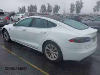 2018 Tesla Model S 75D with VIN 5YJSA1E24JF275038, listed as a IAAI auction lot 41916984 with 116,352 mi miles and . Bid and sale history available at DreamBid. Image 3.