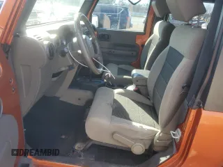 2010 Jeep Wrangler Rubicon with VIN 1J4BA6D17AL208835, listed as a Copart auction lot 41851855 with 107,771 mi miles and Salvage title. Bid and sale history available at DreamBid. Image 7.