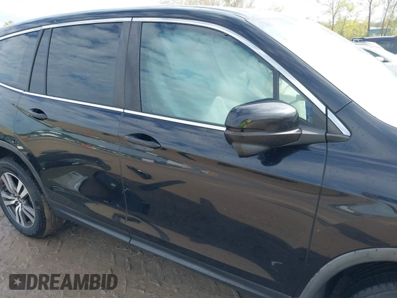 2016 Honda Pilot EX-L with VIN 5FNYF6H5XGB031594, listed as a IAAI auction lot 40409867 with 132,227 mi miles. Bid and sale history available at carsss.com. Image 13.