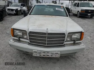 1989 Mercedes-Benz 560 with VIN WDBCA39E0KA469417, listed as a Copart auction lot 43929215 with 52,559 mi miles and Salvage Title. Bid and sale history available at DreamBid. Image 5.