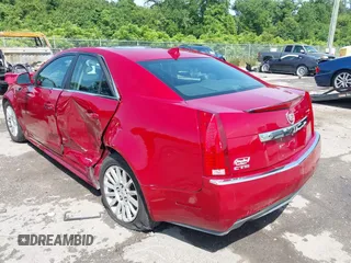 2013 Cadillac CTS Luxury with VIN 1G6DE5E55D0157455, listed as a IAAI auction lot 42469959 with 107,274 mi miles and . Bid and sale history available at DreamBid. Image 3.