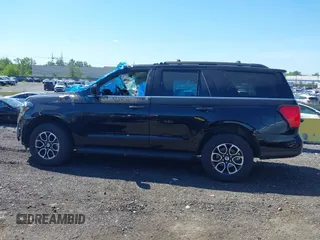 2024 Ford Expedition XLT z VIN 1FMJU1J84REA35560, wystawiony jako IAAI lot #42266211 z przebiegiem 21 950 mil mil oraz . Historia ofert i sprzedaży dostępna na DreamBid. Obrazek 14.