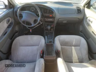 2004 Kia Spectra z VIN KNAFB121045315435, wystawiony jako Copart lot #83082084 z przebiegiem 94 974 mil mil oraz Czysty tytuł • Clean title. Historia ofert i sprzedaży dostępna na DreamBid. Obrazek 8.