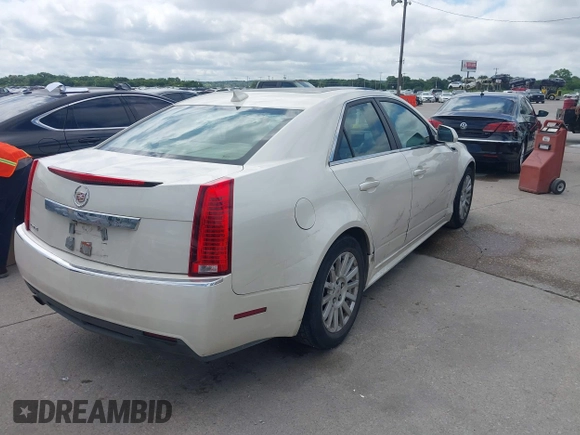 2012 Cadillac CTS Luxury with VIN 1G6DF5E50C0131857, listed as a IAAI auction lot 42610389 with 85,896 mi miles and . Bid and sale history available at DreamBid. Image 4.
