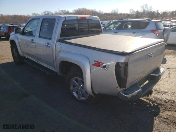 2011 Chevrolet Colorado LT w/2LT with VIN 1GCHTDFE9B8132229, listed as a Copart auction lot 79424884 with 147,515 mi miles and Salvage Title. Bid and sale history available at carsss.com. Image 2.
