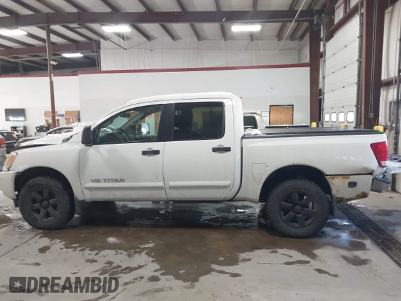 2014 Nissan Titan S with VIN 1N6AA0EC2EN512337, listed as a IAAI auction lot 41337837 with 187,540 mi miles and . Bid and sale history available at DreamBid. Image 14.
